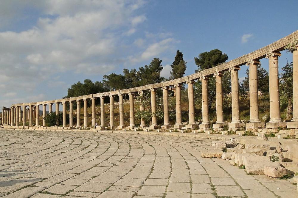 The colonnaded street and oval plaza at Jerash in low light The colonnaded street and oval plaza at Jerash in low light
