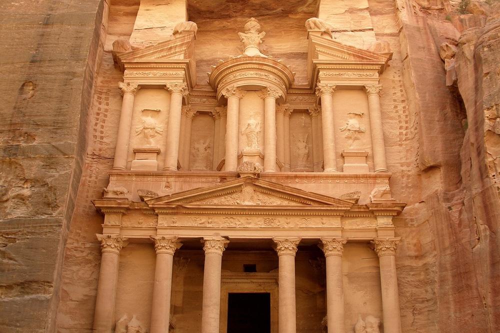 The Treasury at Petra framed by the narrow end of the Siq The Treasury at Petra framed by the narrow end of the Siq
