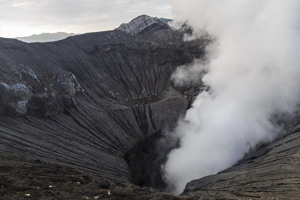 The Tengger sand sea and the smoking cone of Bromo at dawn The Tengger sand sea and the smoking cone of Bromo at dawn