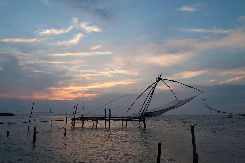 Cantilevered Chinese fishing nets on the Fort Kochi sea wall Cantilevered Chinese fishing nets on the Fort Kochi sea wall