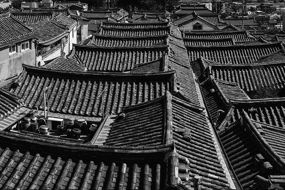 Tiled roofs of the Bukchon hanok district above central Seoul Tiled roofs of the Bukchon hanok district above central Seoul