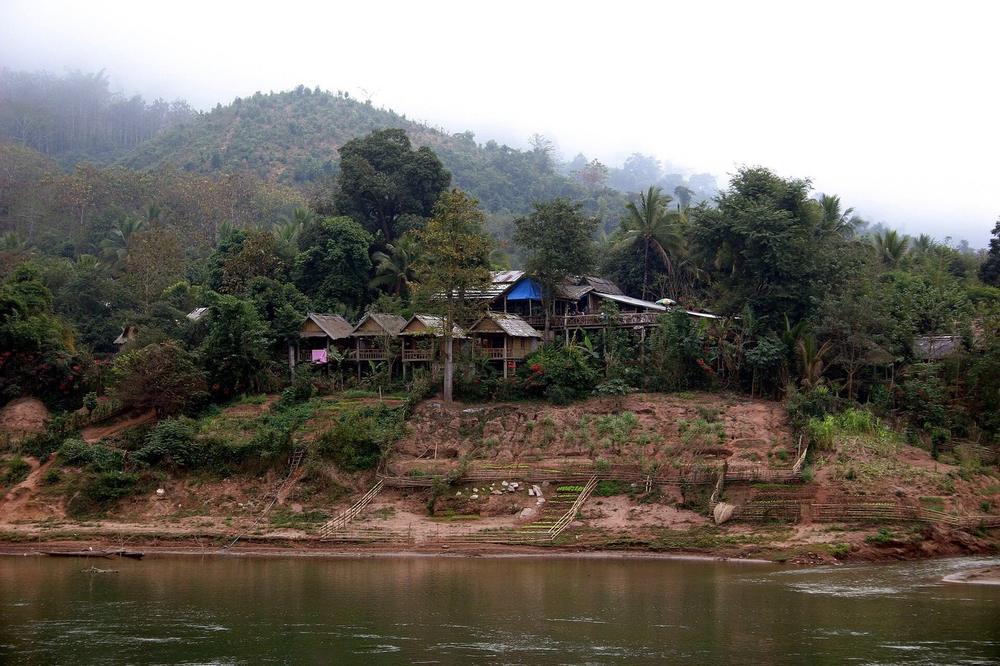 Mist sitting between limestone cliffs above the Nam Ou Mist sitting between limestone cliffs above the Nam Ou