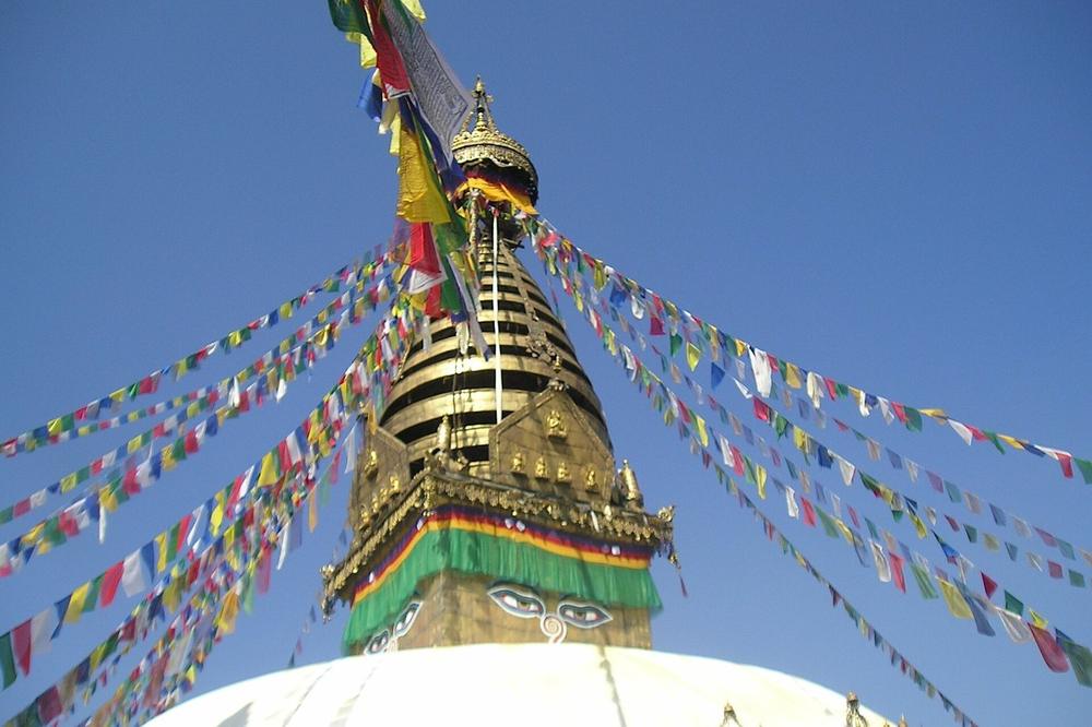 The stupa and prayer flags at Swayambhunath above Kathmandu The stupa and prayer flags at Swayambhunath above Kathmandu