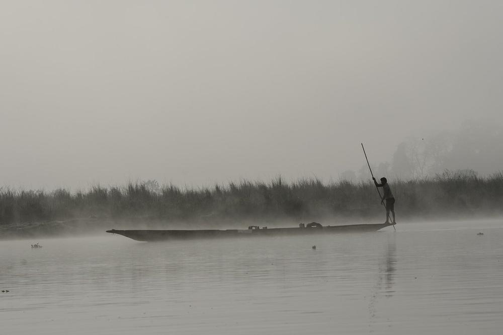 Mist over the Rapti river and grassland at Chitwan Mist over the Rapti river and grassland at Chitwan