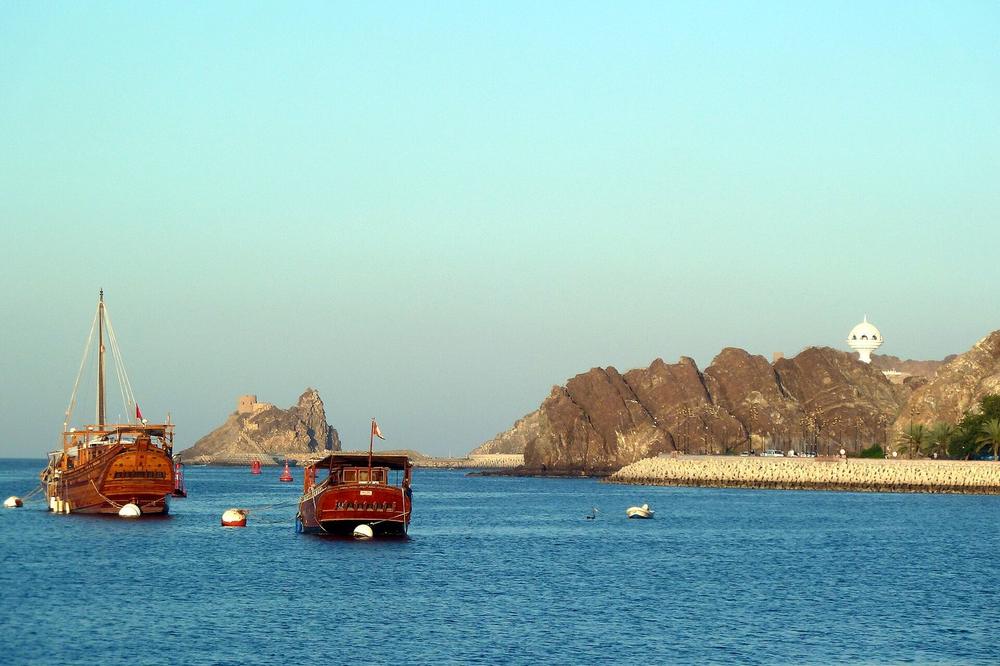 Dhows moored below the corniche at Mutrah, Muscat Dhows moored below the corniche at Mutrah, Muscat